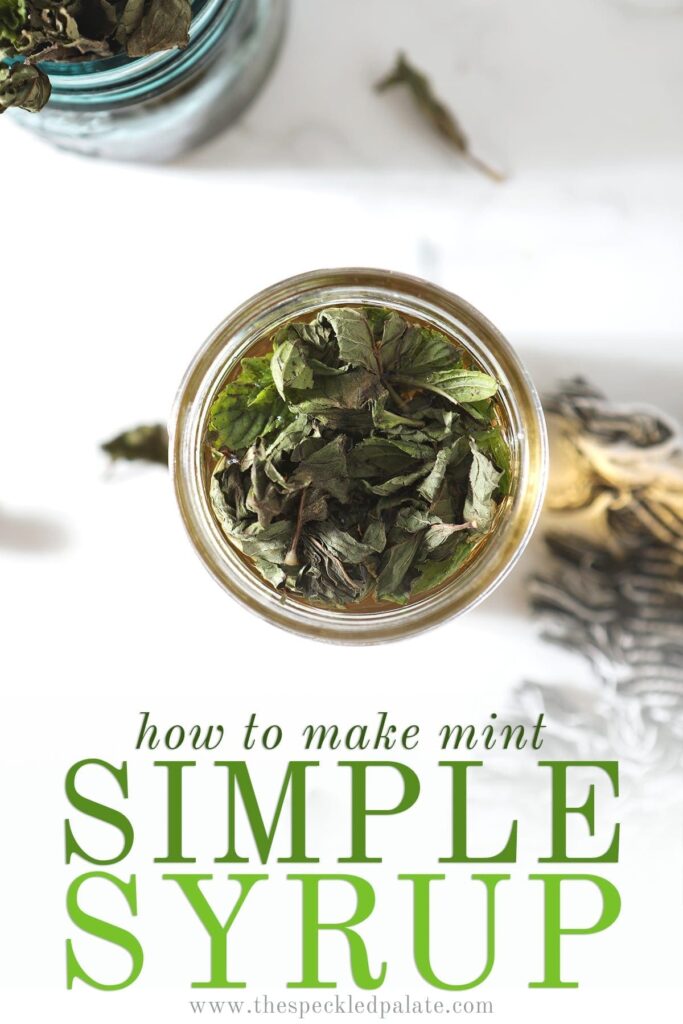 Mint leaves sit on top of a jar of simple syrup before being stirred in with the text 'how to make mint simple syrup'