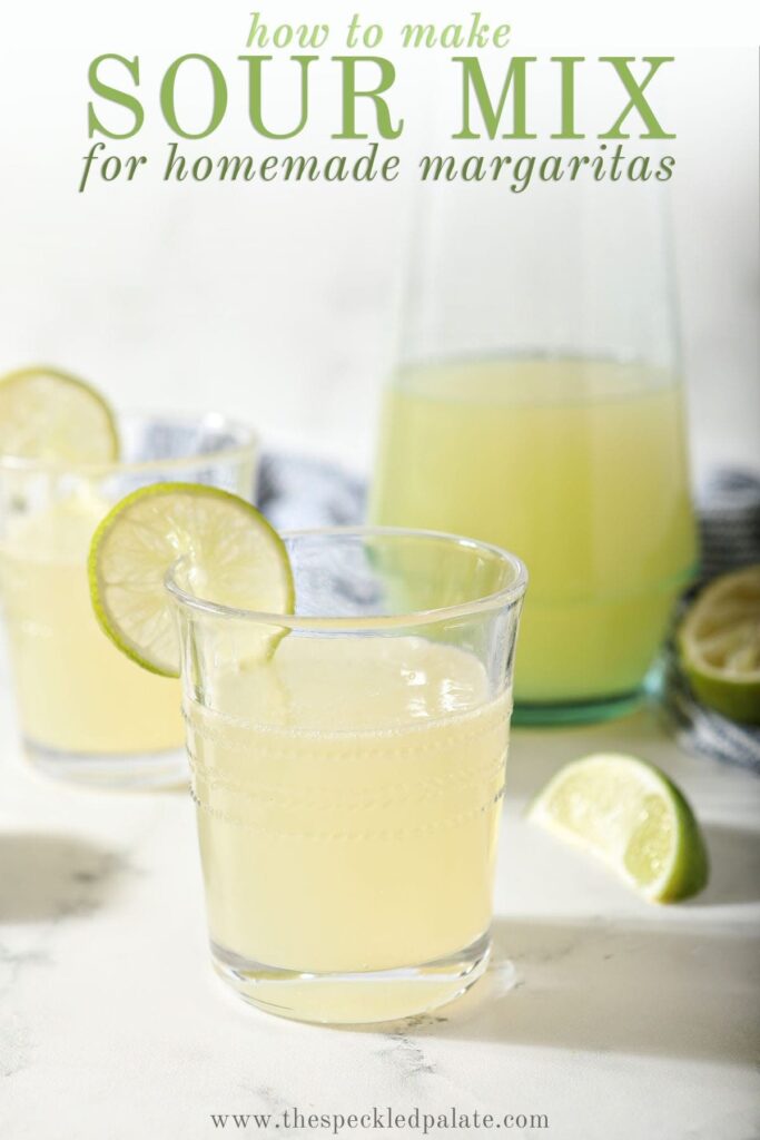 Two margaritas sit in front of a pitcher of homemade margarita mix with the text 'how to make sour mix for homemade margaritas'