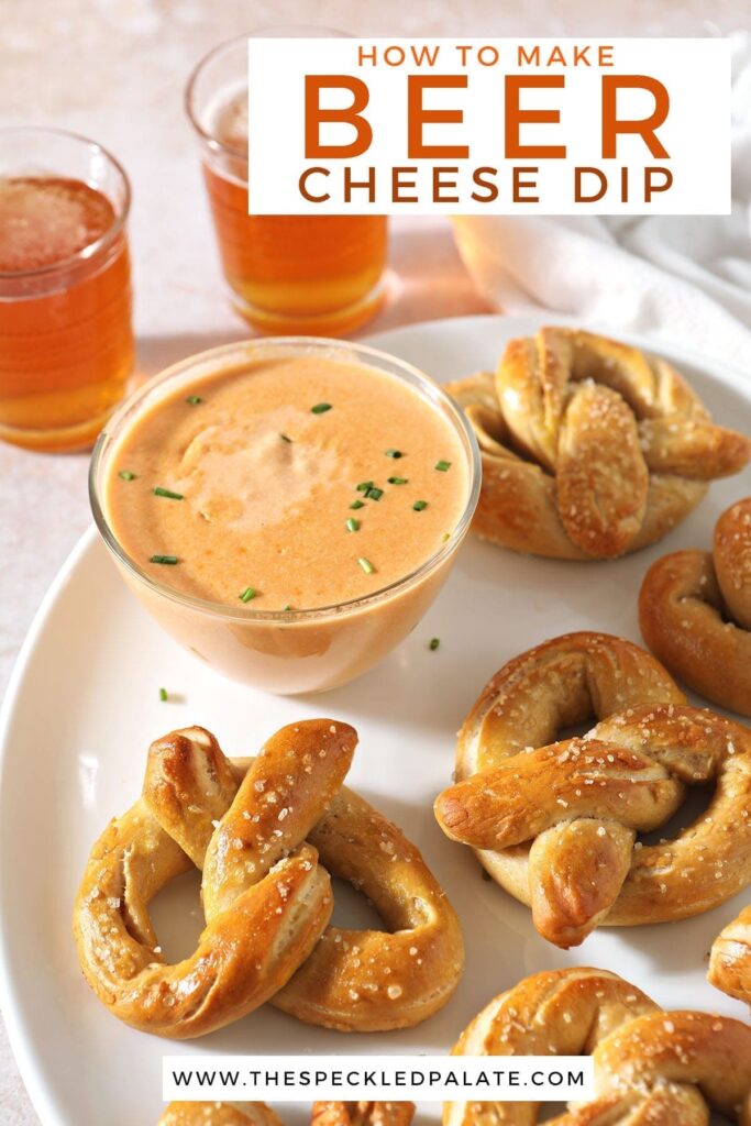 Homemade soft pretzels sit on a white tray next to a bowl of cheese sauce for pretzels and beer with the text 'how to make beer cheese dip'