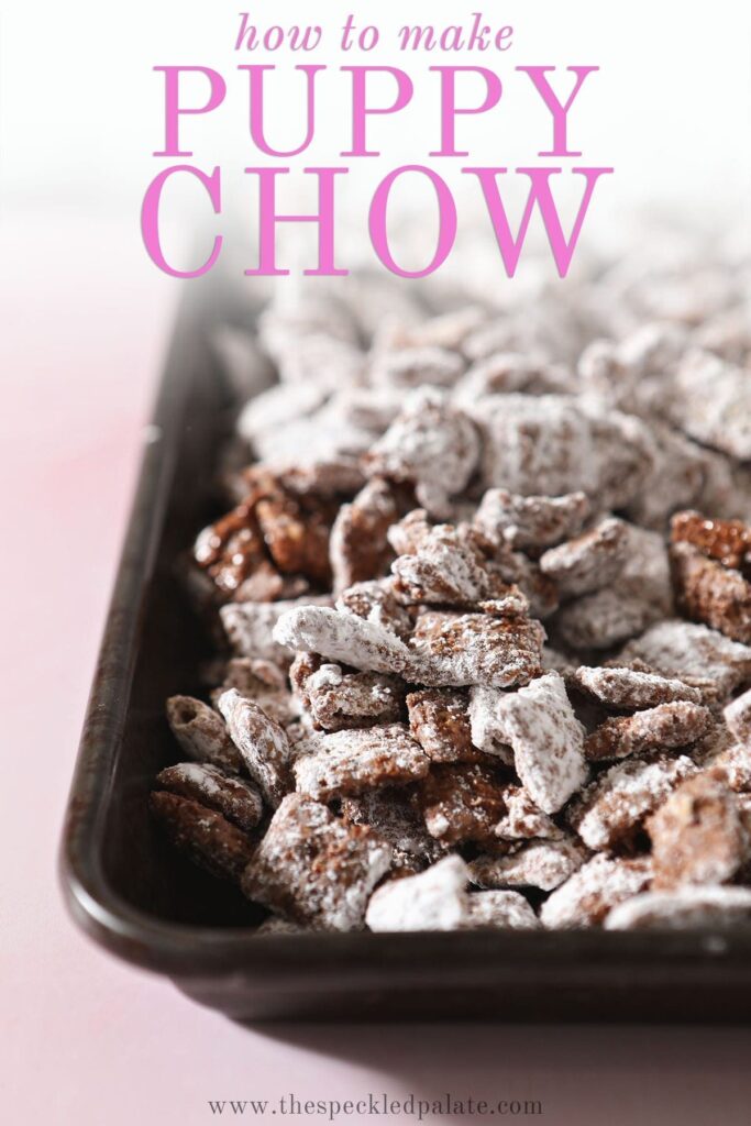 A metal baking sheet holds Puppy Chow with the text 'how to make puppy chow'