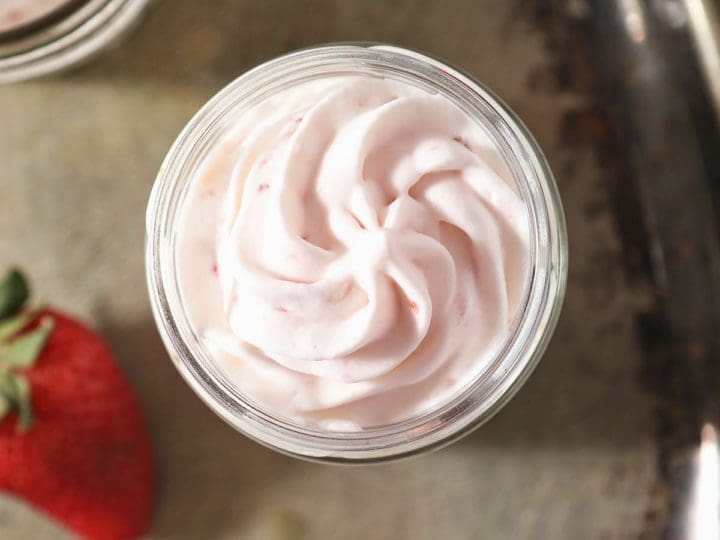 A serving of strawberry whipped cream in a glass