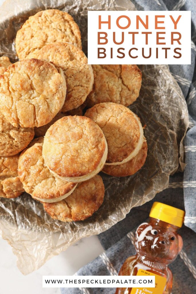 A plate of biscuits next to a honey bottle with the text honey butter biscuits