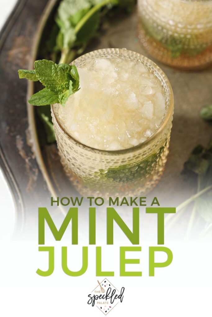 A mint julep garnished with mint on silver with the text 'how to make a mint julep'