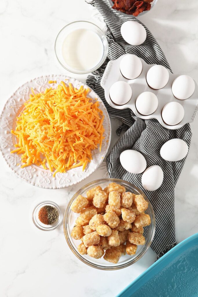 Breakfast casserole ingredients in bowls