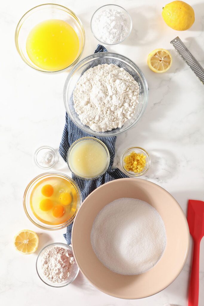 Dessert ingredients sit in bowls before mixing together