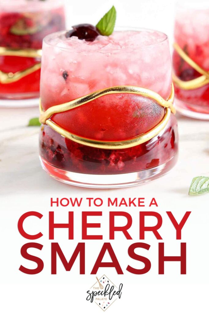 Close up of a bright red cocktail with the text how to make a cherry smash