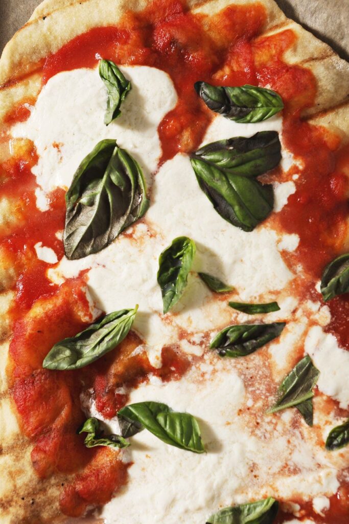 Close up of a grilled margherita pizza