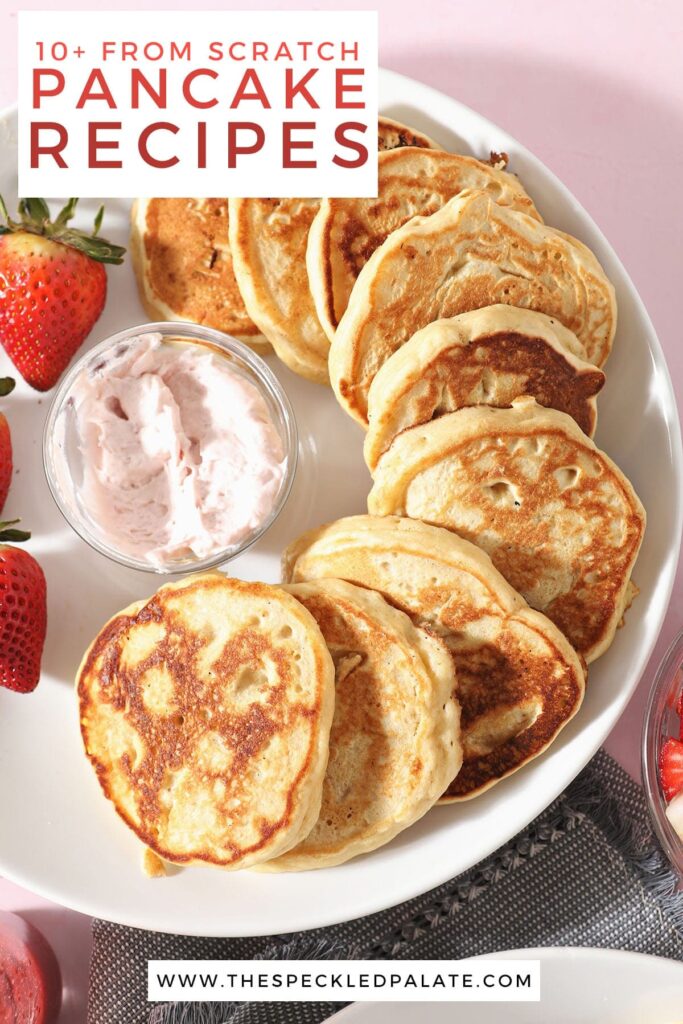 A white plate holds pancakes with strawberries and whipped cream with the text 10+ from scratch pancake recipes