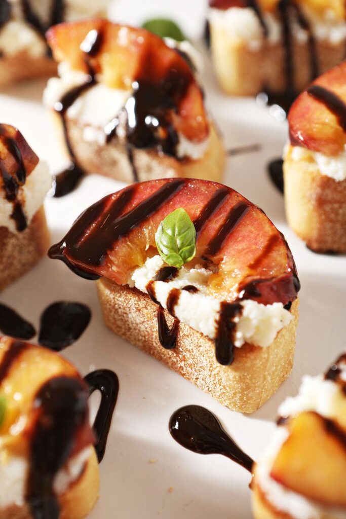 Close up of a Ricotta Crostini with a Grilled Peach