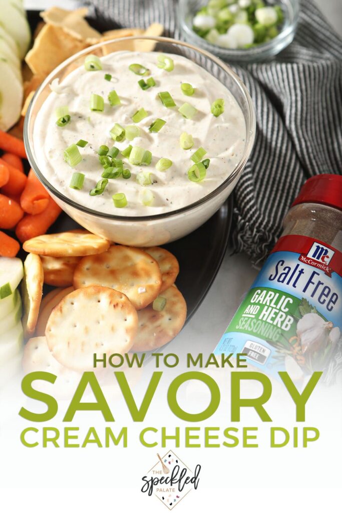 A bowl of Garlic and Herb Cream Cheese Dip with dippers with the text how to make savory cream cheese dip