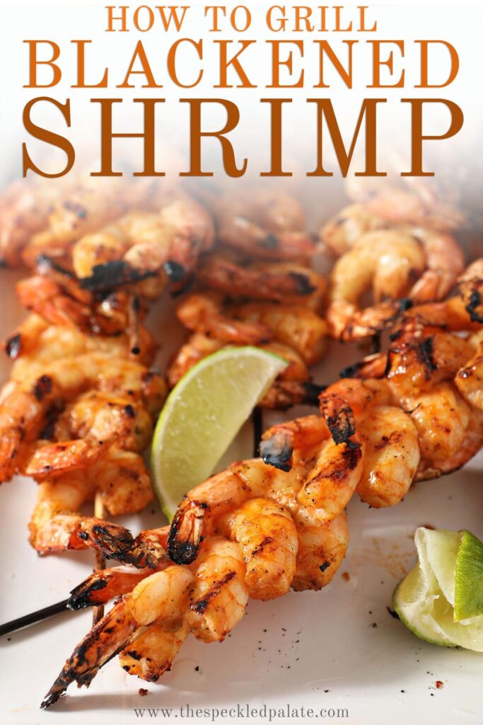 Skewers of shrimp on a white plate with the text how to grill blackened shrimp