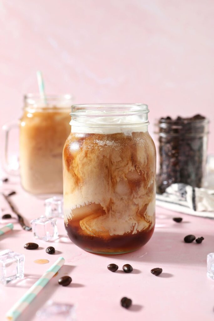 Vanilla sweet cream swirls into cold brew coffee