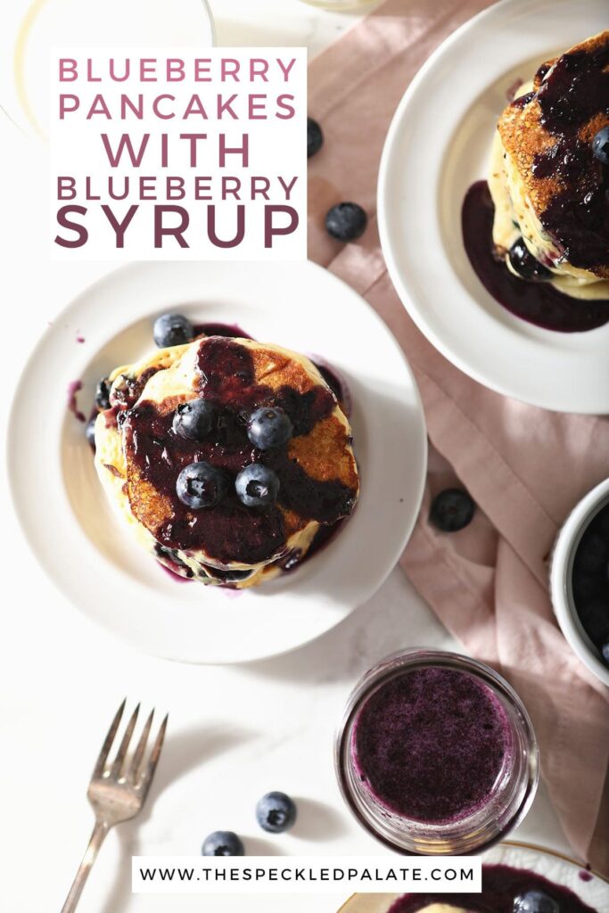 Plates hold pancakes topped with blueberries with the text blueberry pancakes with blueberry syrup