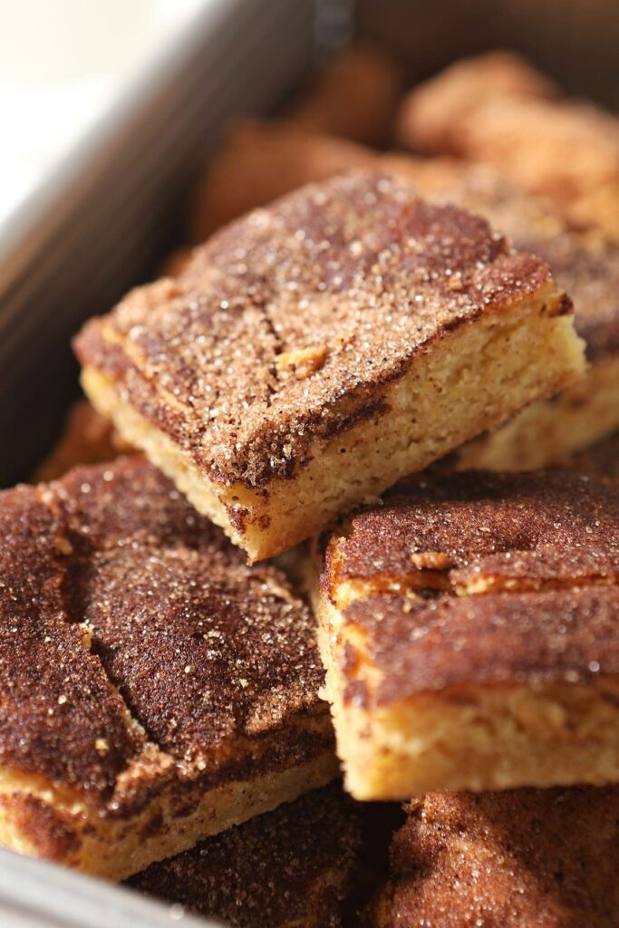 Stacked snickerdoodle bars on a silver tray