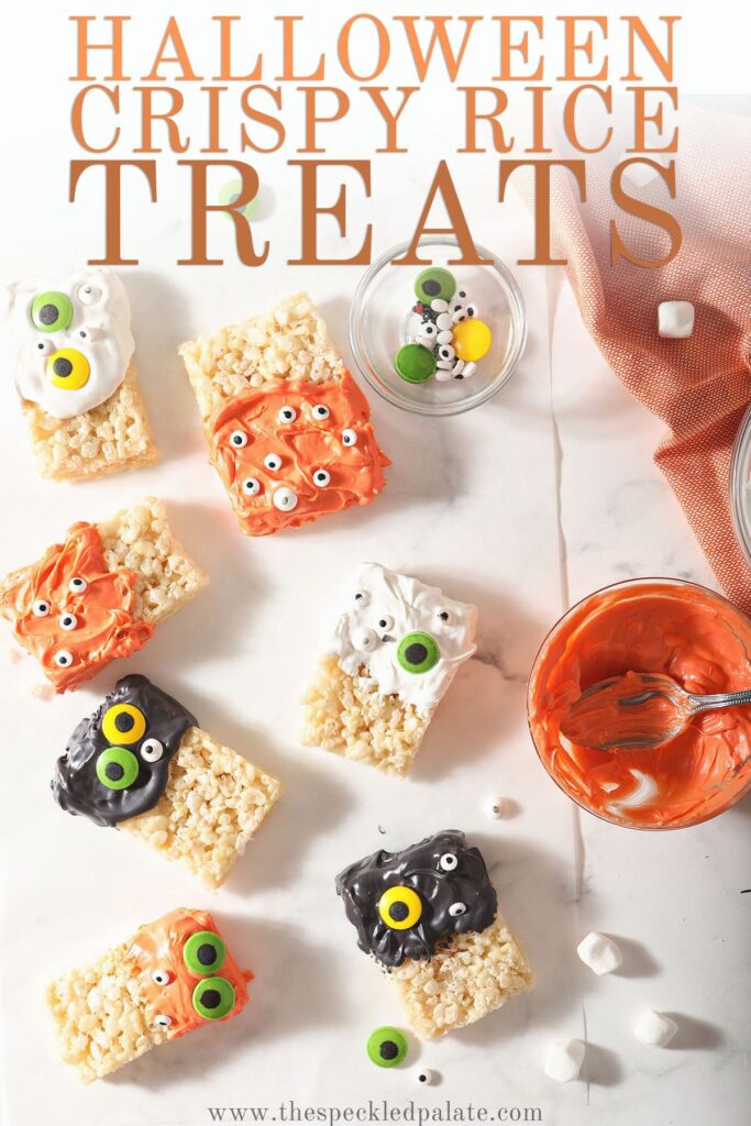 Treats decorated as orange, white and black monsters with the text Halloween Crispy Rice Treats