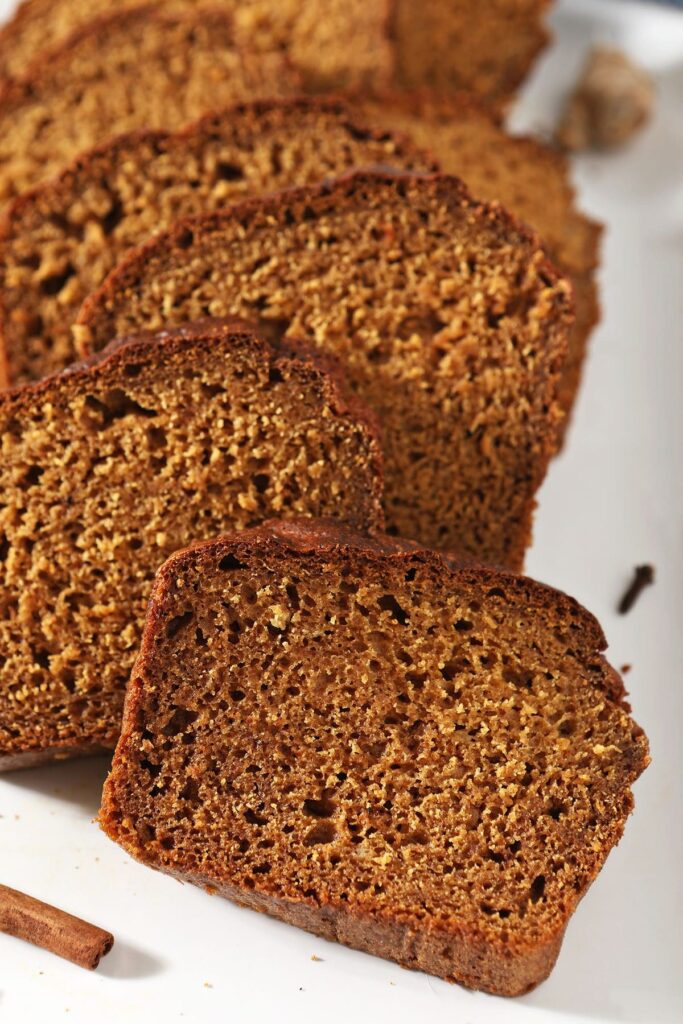 Close up of slices of Pumpkin Spice Bread on a white tray