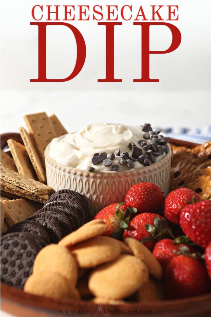 A decorative bowl holds dessert dip with dippers with the text cheesecake dip