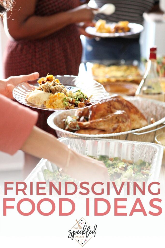 Guests fill their plates buffet-style with the text friendsgiving food ideas