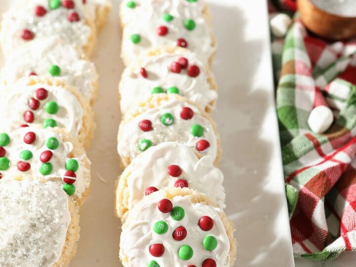 A platter of decorated Rice Krispie Treat ornaments for Christmas