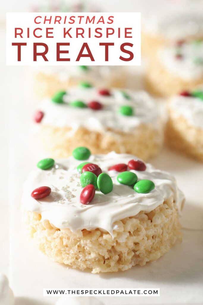 A round krispie treat decorated with chocolate-coated candies with the text Christmas Rice Krispie Treats