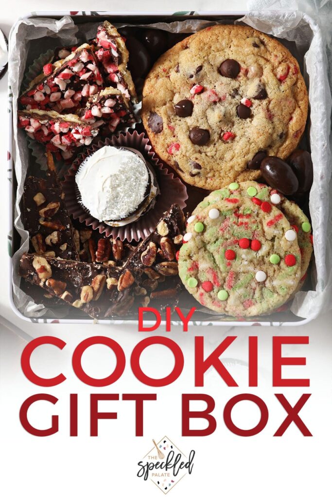 Overhead of a tin of cookies and treats with the text DIY cookie gift box