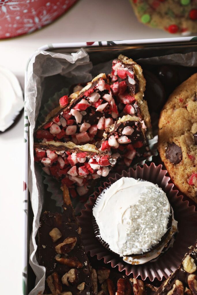 Close up of cracker toffee inside a cookie tin