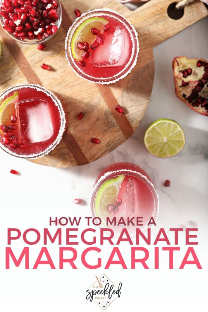 Three red margaritas on wood garnished with lime and pomegranate with the text how to make a pomegranate margarita