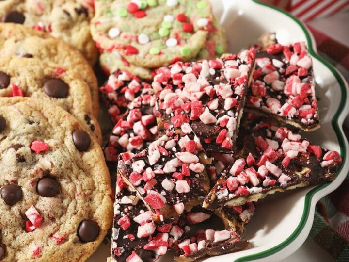 A Christmas cookie tray holding peppermint saltine cracker toffee and cookies