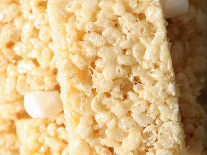 A stack of homemade rice krispie treats in a pan