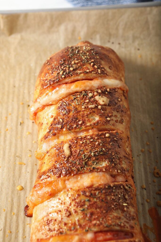 A baked pepperoni stromboli before slicing