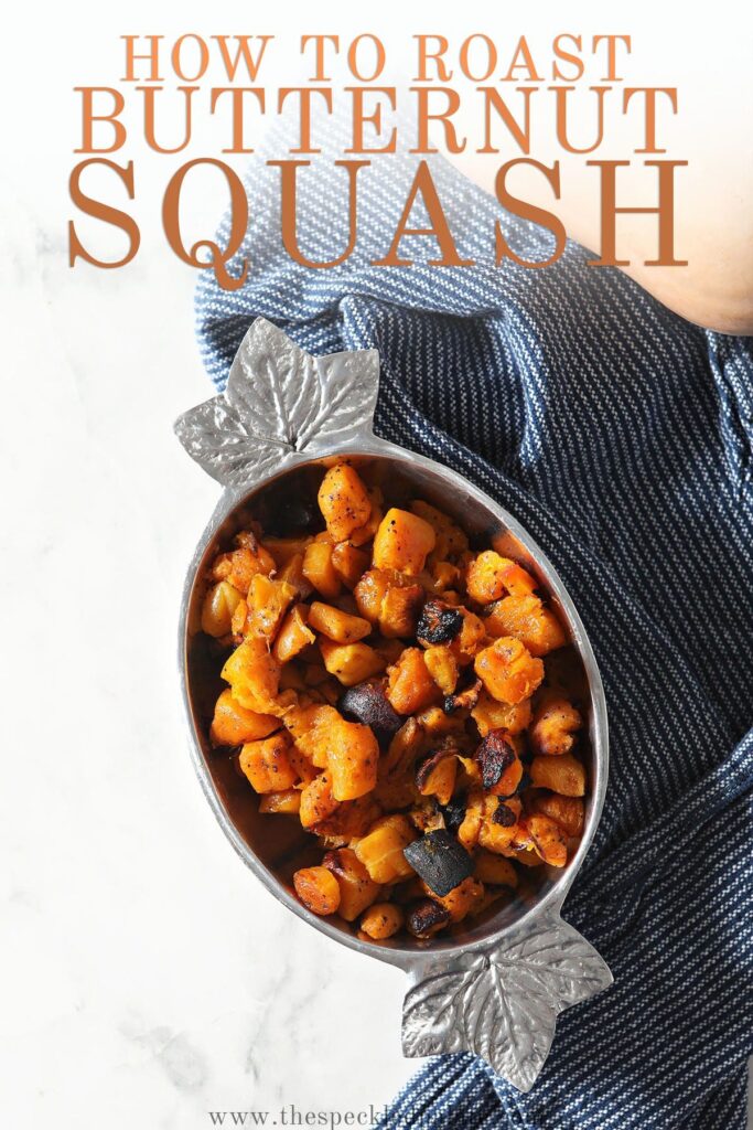 A silver bowl with roasted butternut squash with the text how to roast butternut squash