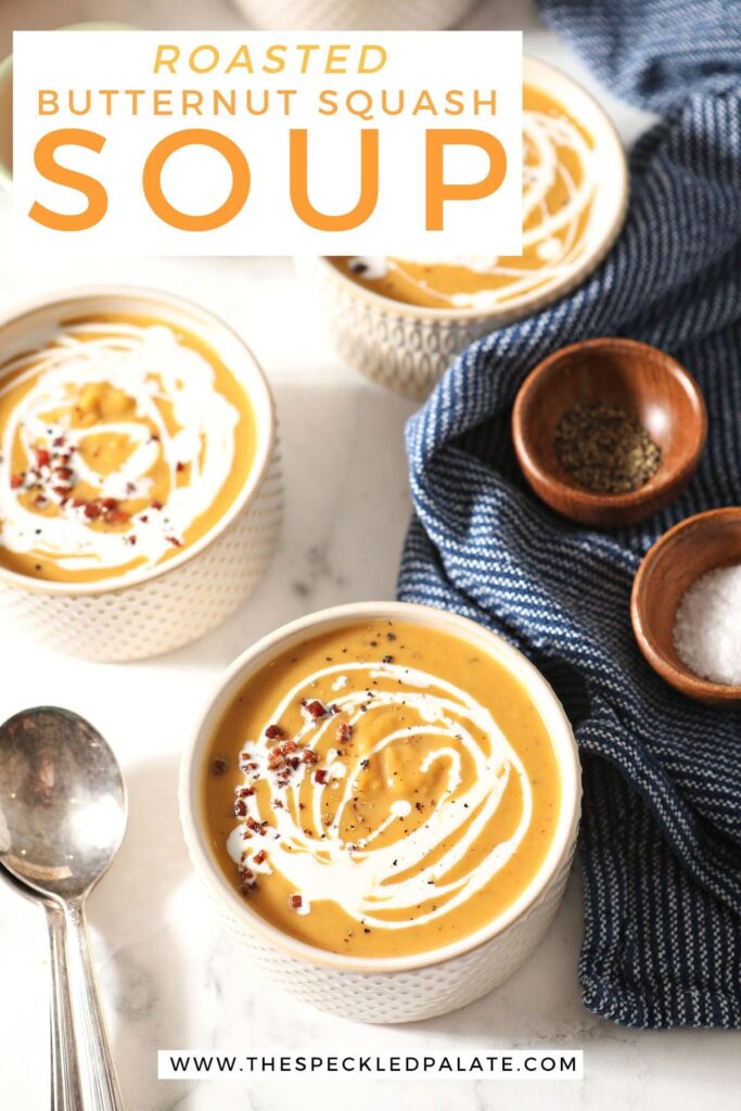 Three bowls of soup in white bowls next to a blue towel with the text roasted butternut squash soup