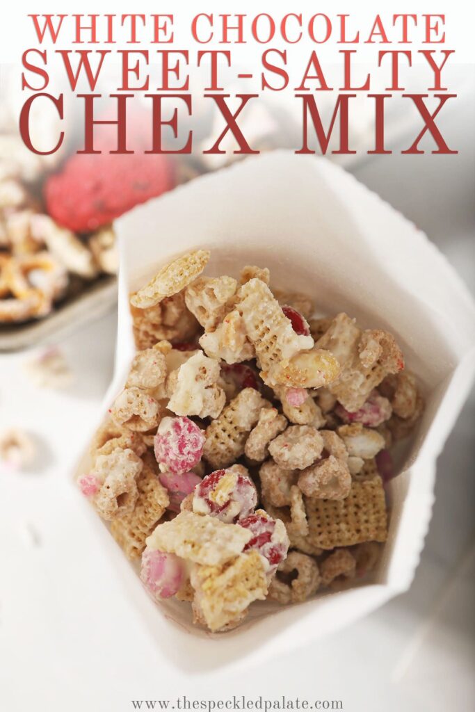 Peeking into a bag of Valentine's Day snack mix with the text white chocolate sweet-salty chex mix