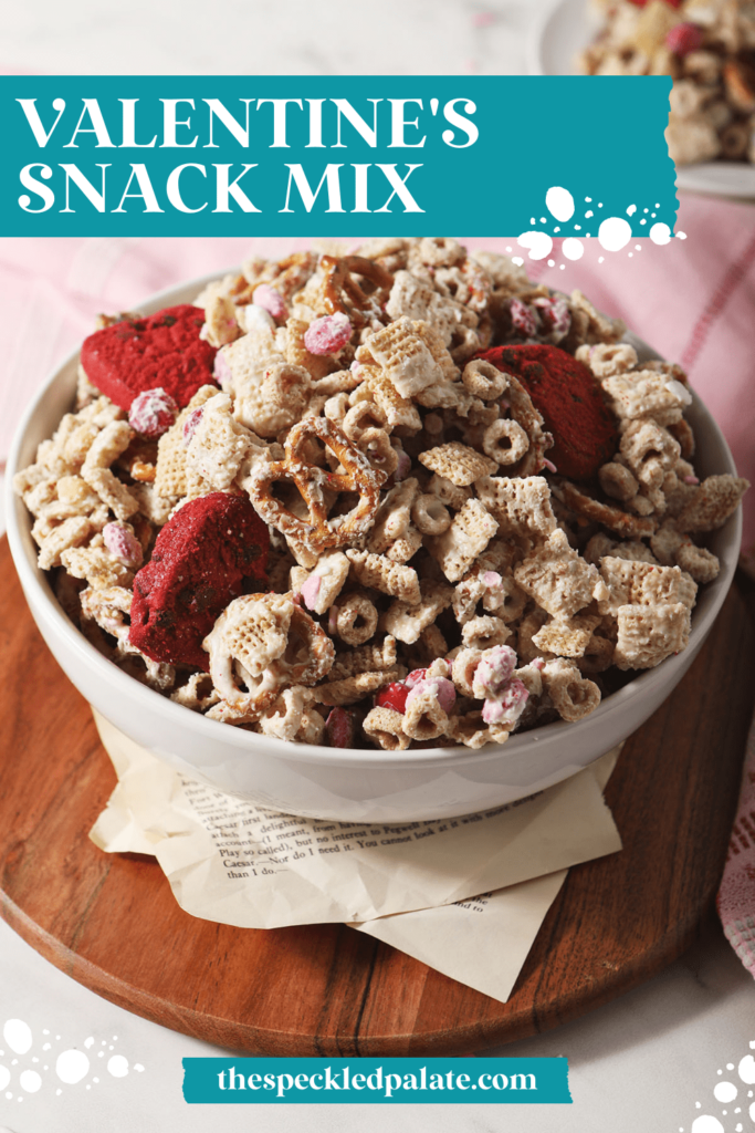 A bowl of Valentine's Day white chocolate chex mix with the text valentine's snack mix