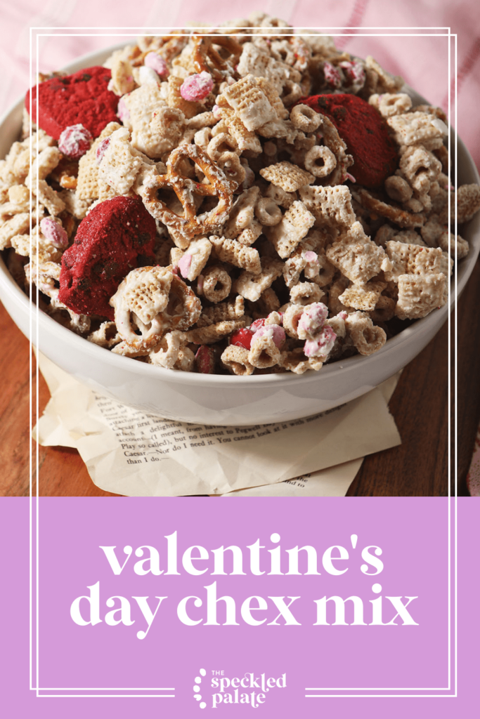 A bowl of Valentine's Day white chocolate snack mix with the text valentine's day chex mix