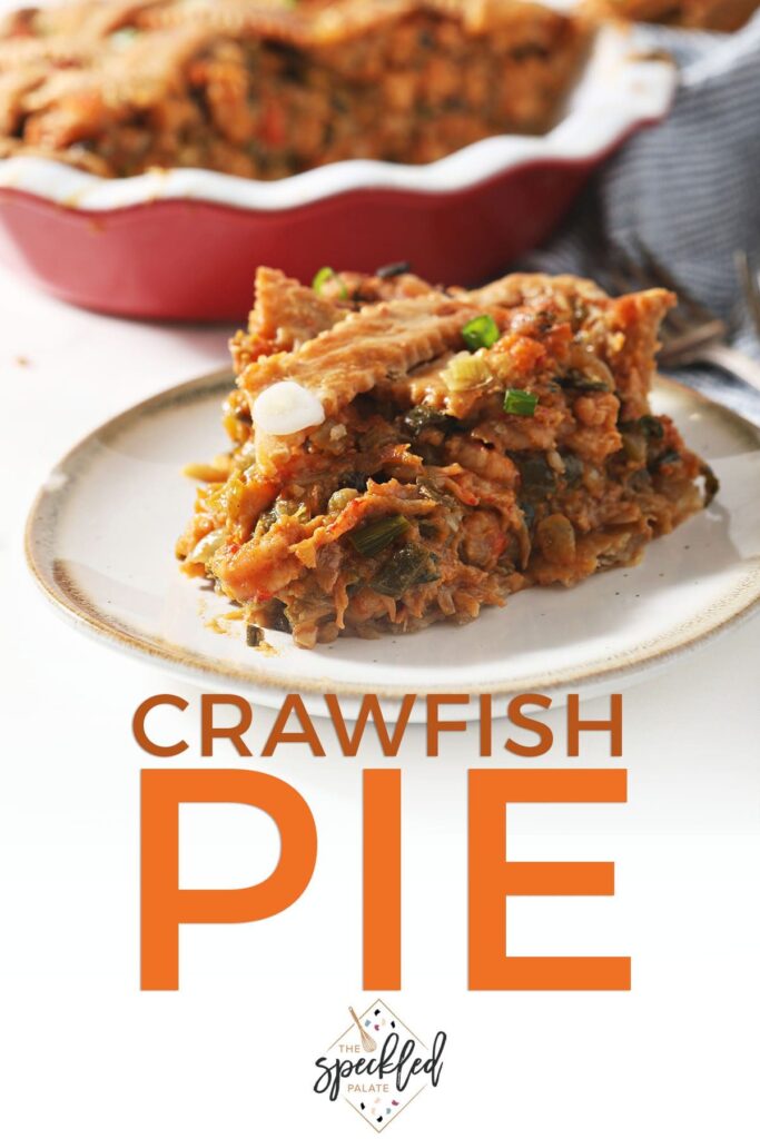 A slice of savory pie on a plate with the text crawfish pie