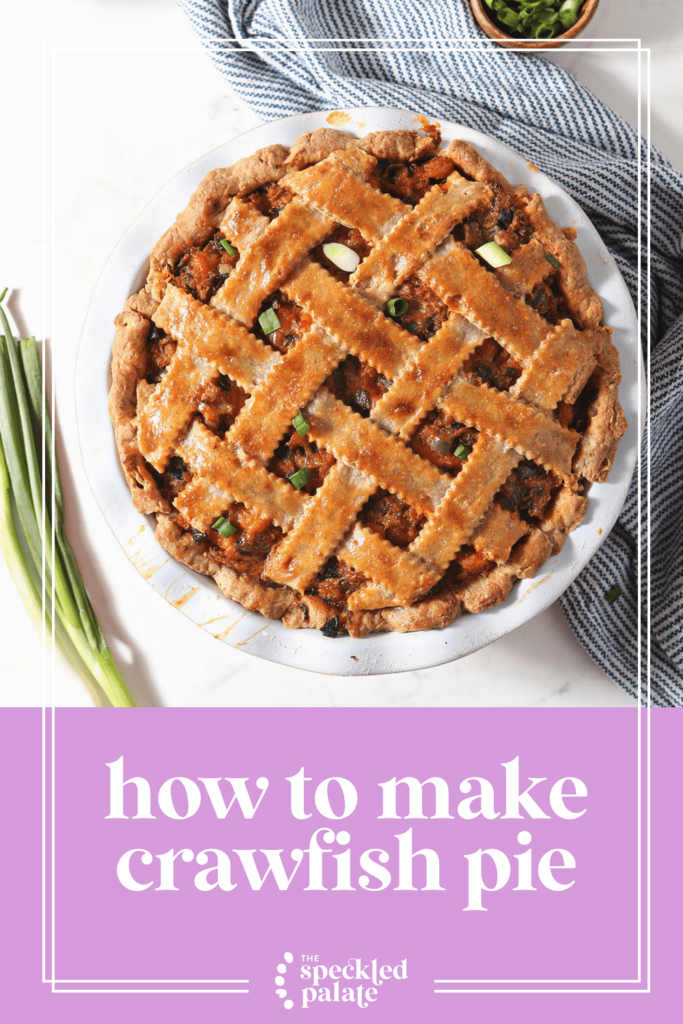 A lattice-covered pie on marble with the text how to make crawfish pie