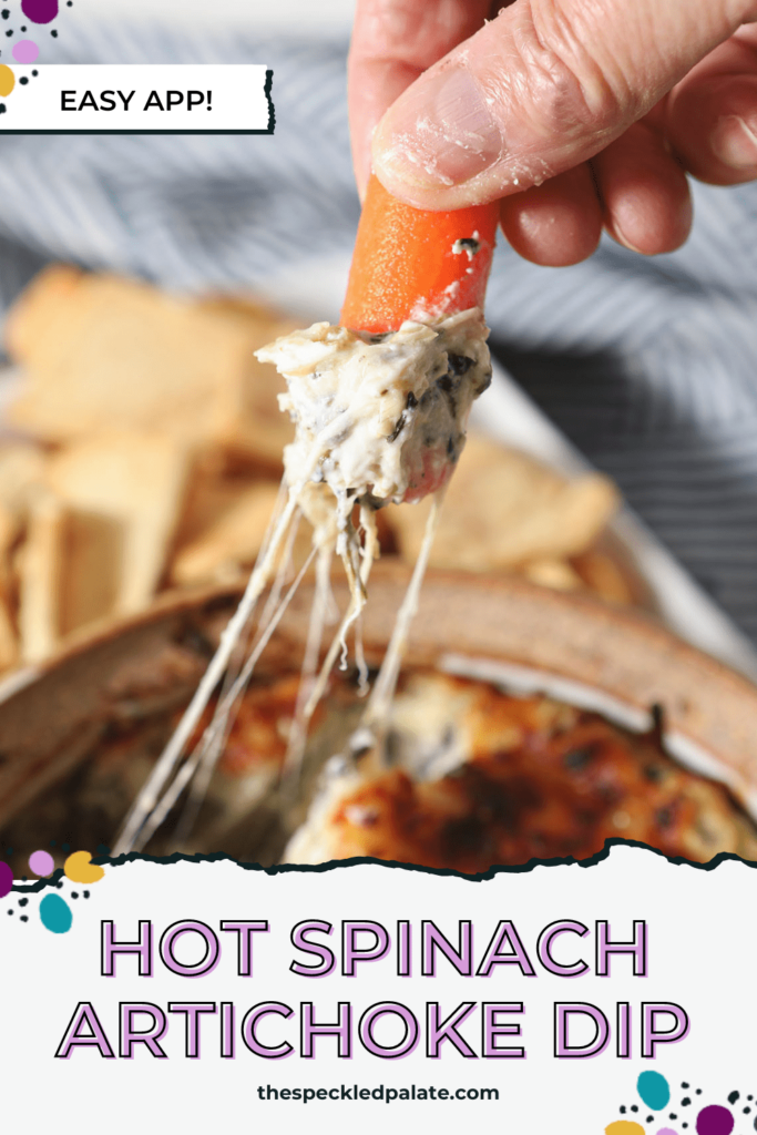 A carrot pulls a string of cheese and dip from a bowl with the text 'hot spinach artichoke dip'