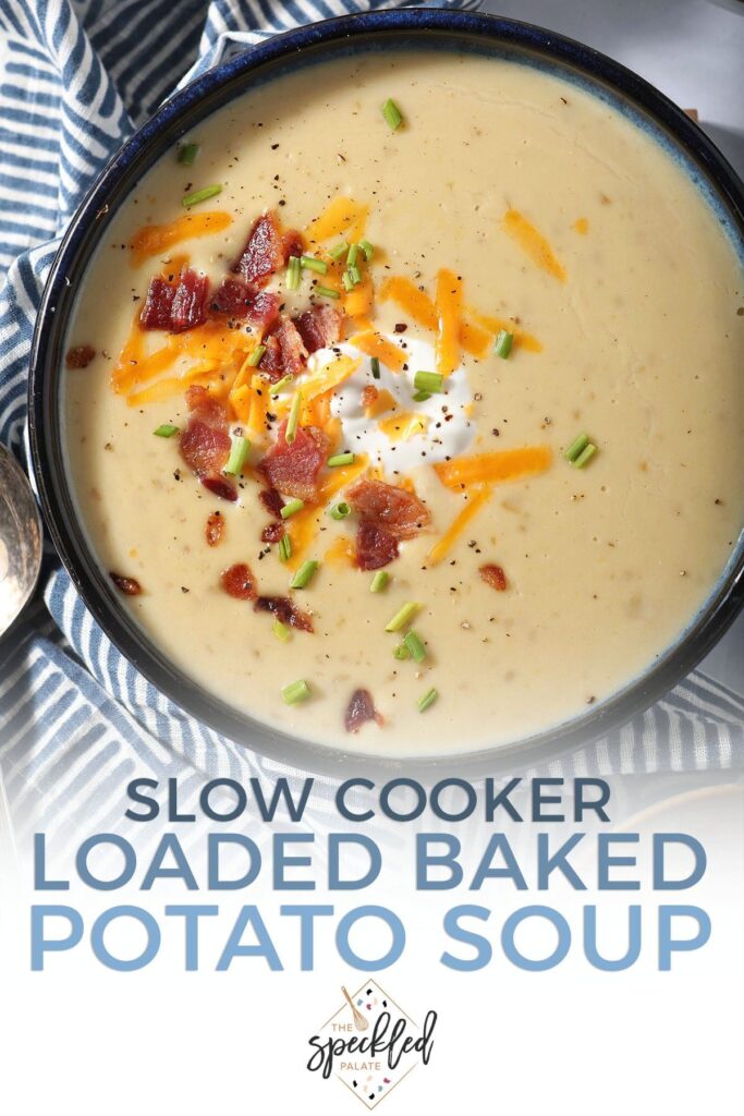 Close up of a bowl of potato soup with garnishes with the text slow cooker loaded baked potato soup