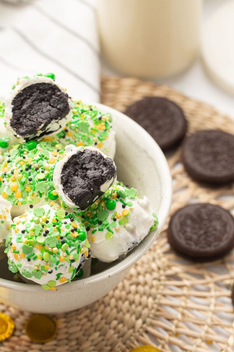 Oreo truffles decorated for St. Patrick's Day in a bowl
