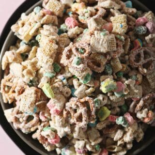 A bowl of St. Patrick's Day Snack Mix on a black plate