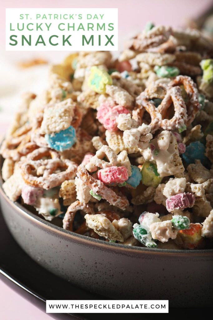 A bowl of a holiday Chex mix with the text St. Patrick's Day Lucky Charms Snack Mix