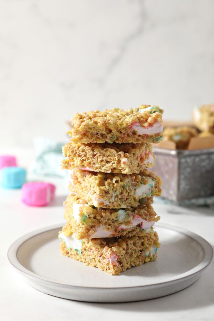 Stacked Easter Rice Krispie Treats on a white plate