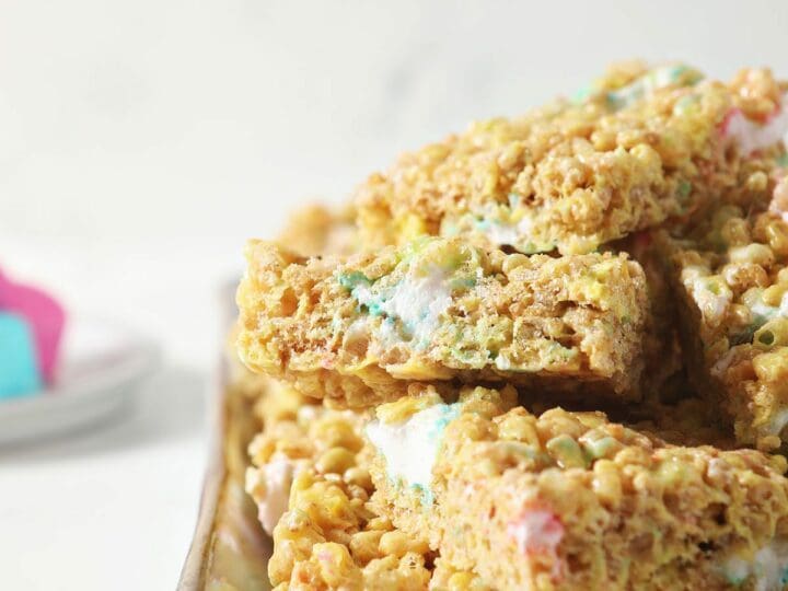 A stack of peeps rice krispie treats on a white platter
