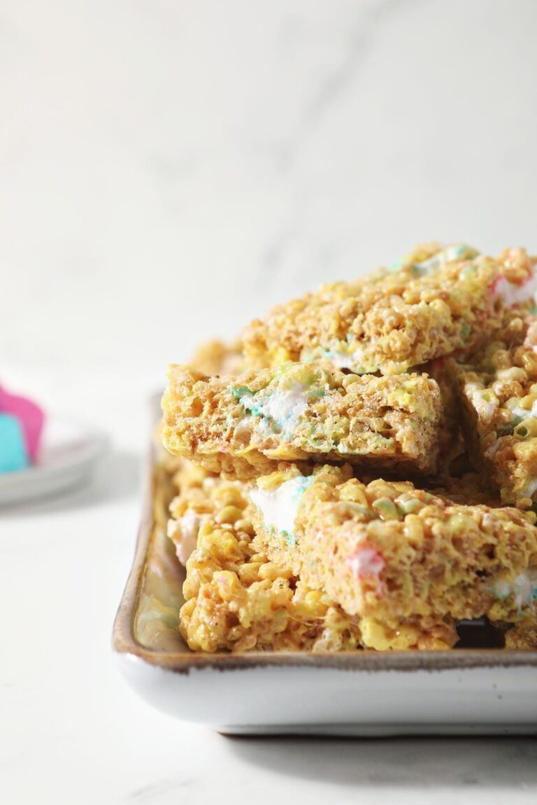 A stack of peeps rice krispie treats on a white platter