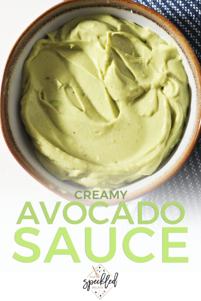 A bowl of green sauce with the text creamy avocado sauce