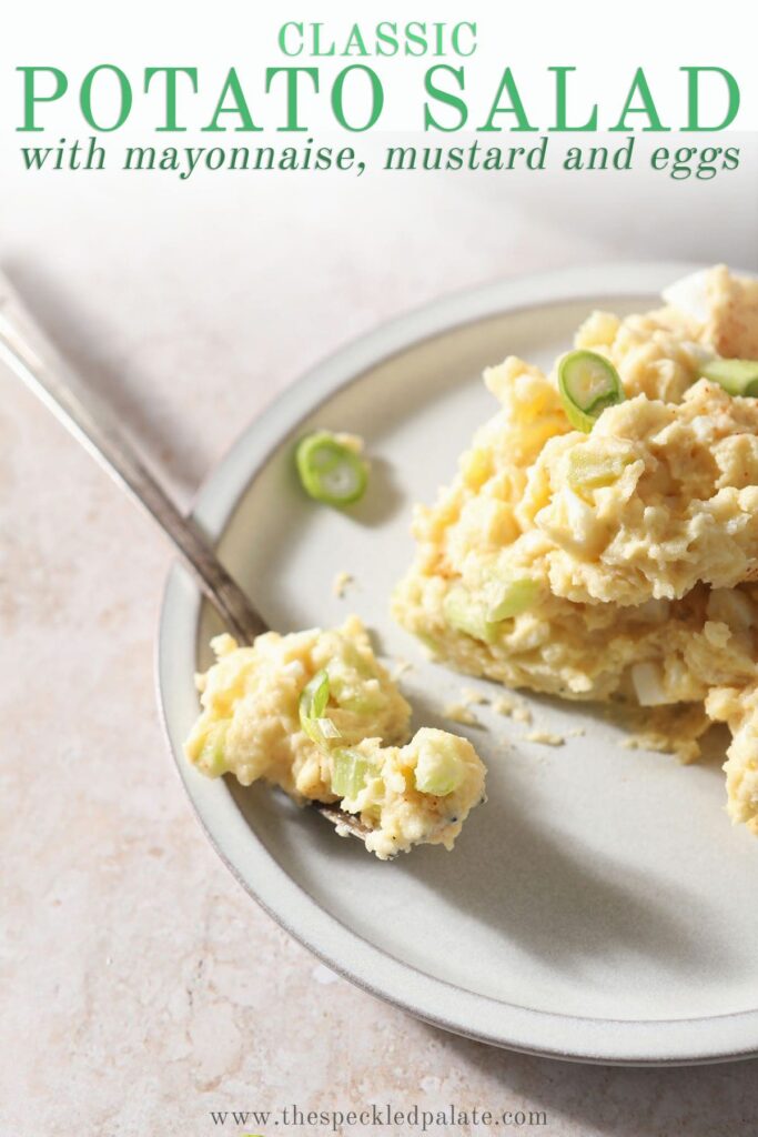 Traditional potato salad on a plate with a fork with the text classic potato salad with mayonnaise, mustard and eggs