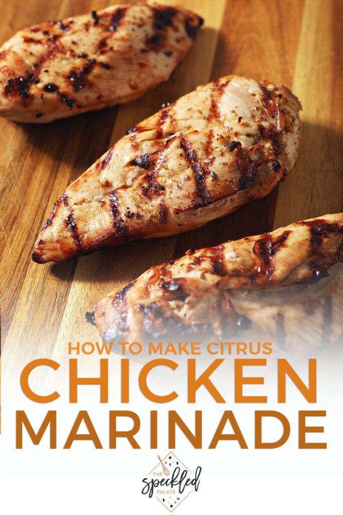 Three grilled chicken breasts on a wooden cutting board with the text how to make citrus chicken marinade