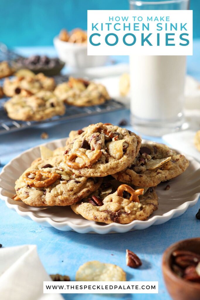 A plate of cookies piled high next to a cooling rack and a glass of milk with the text how to make kitchen sink cookies