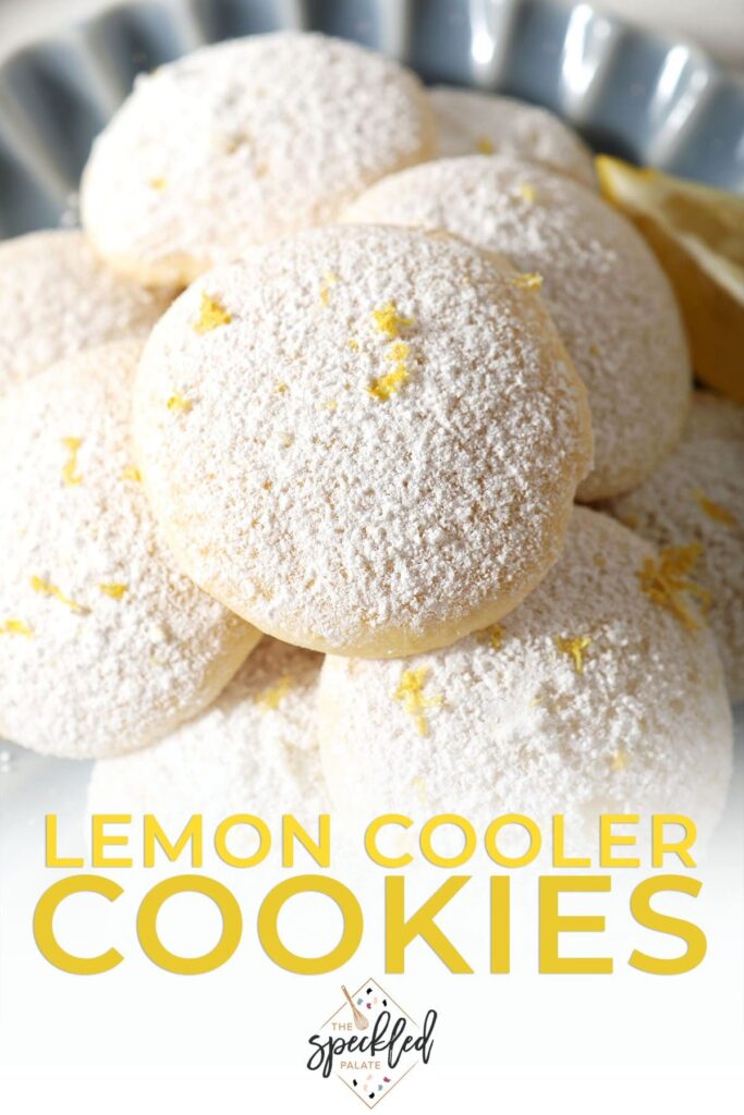 Close up of a plate of sugar-covered cookies with the text Lemon Cooler Cookies